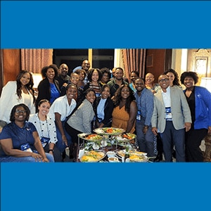 group of black stem professionals at gathering smiling