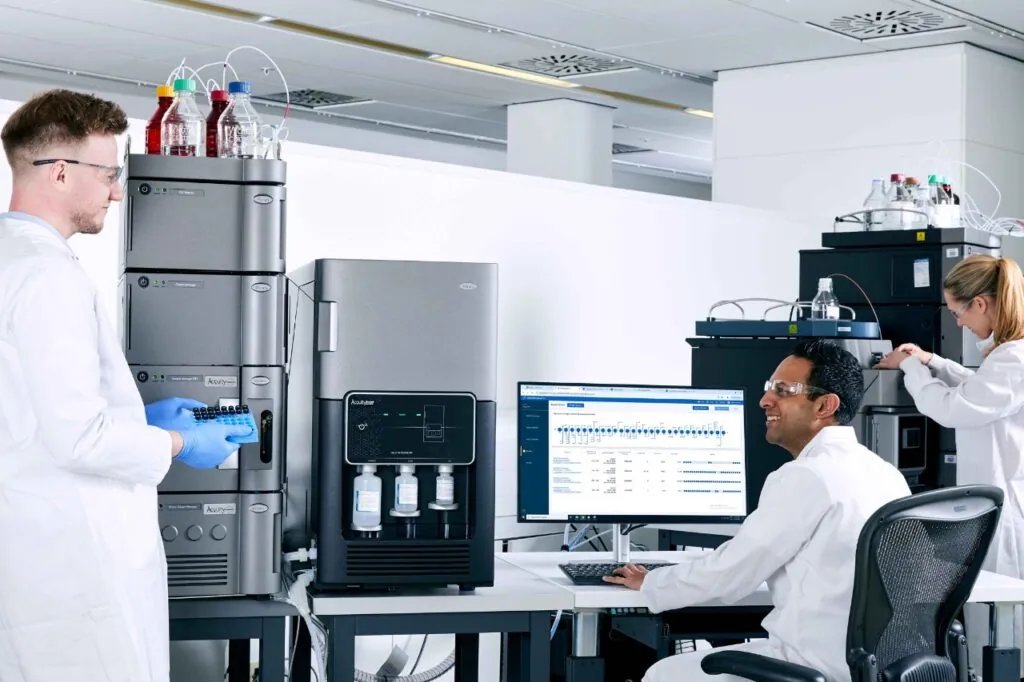 Waters scientists in the lab with BioAccord System