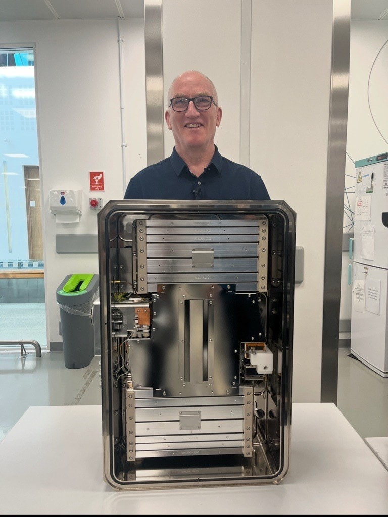 Jason, the man behind the technology, standing behind a Xevo MRT MS