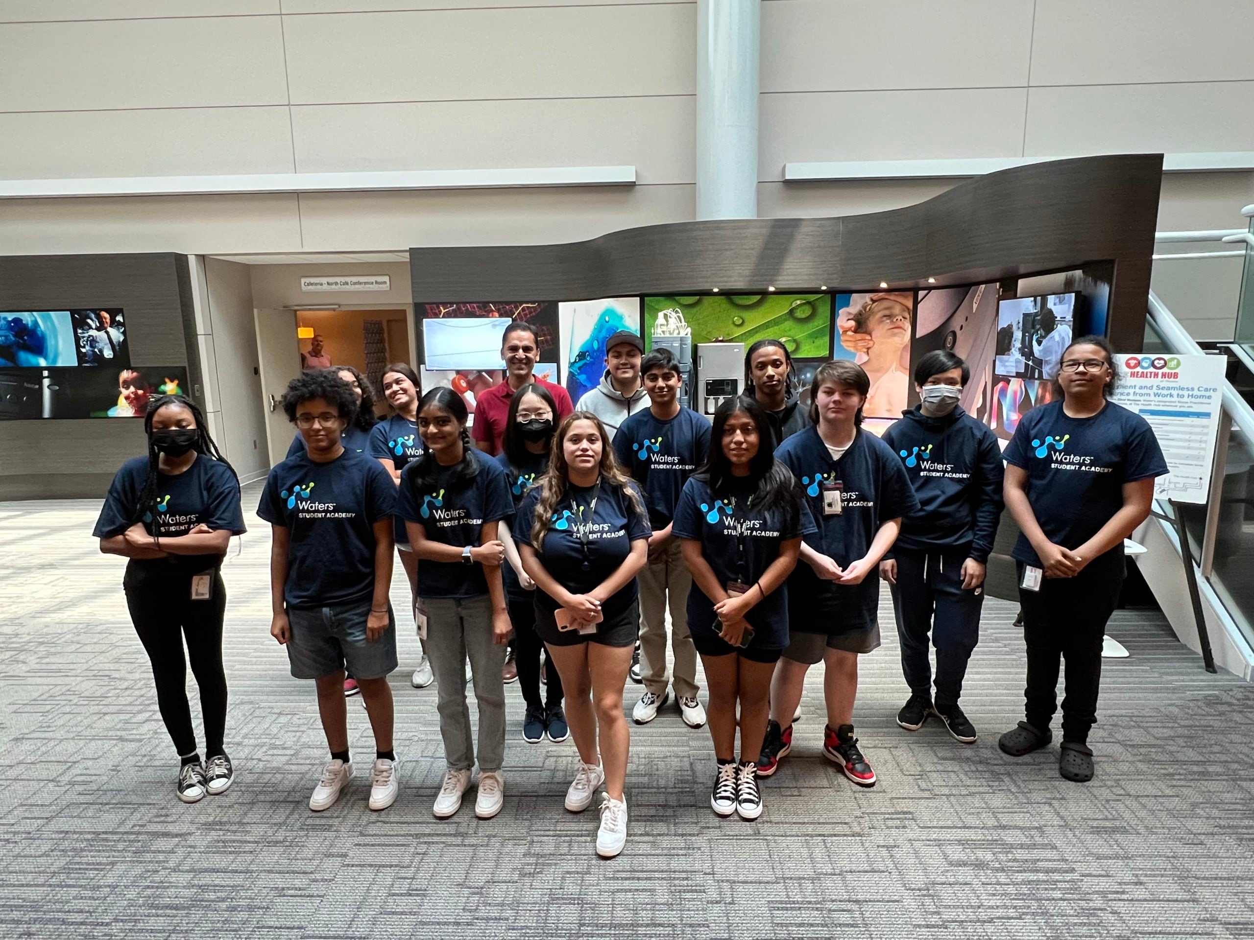 waters student academy group stands together