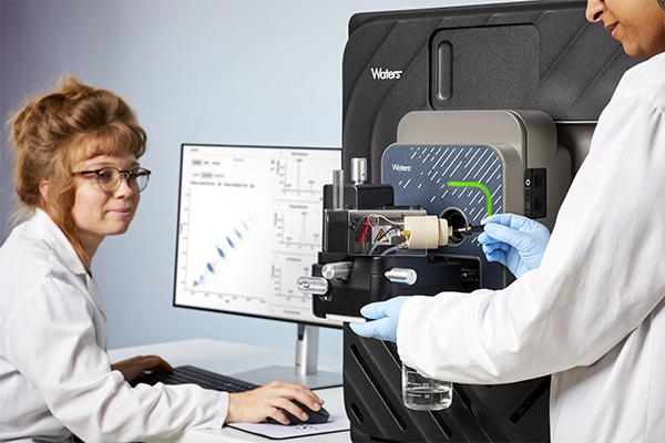 xevo cdms woman on monitor and woman opening reed full res presentation logo sm