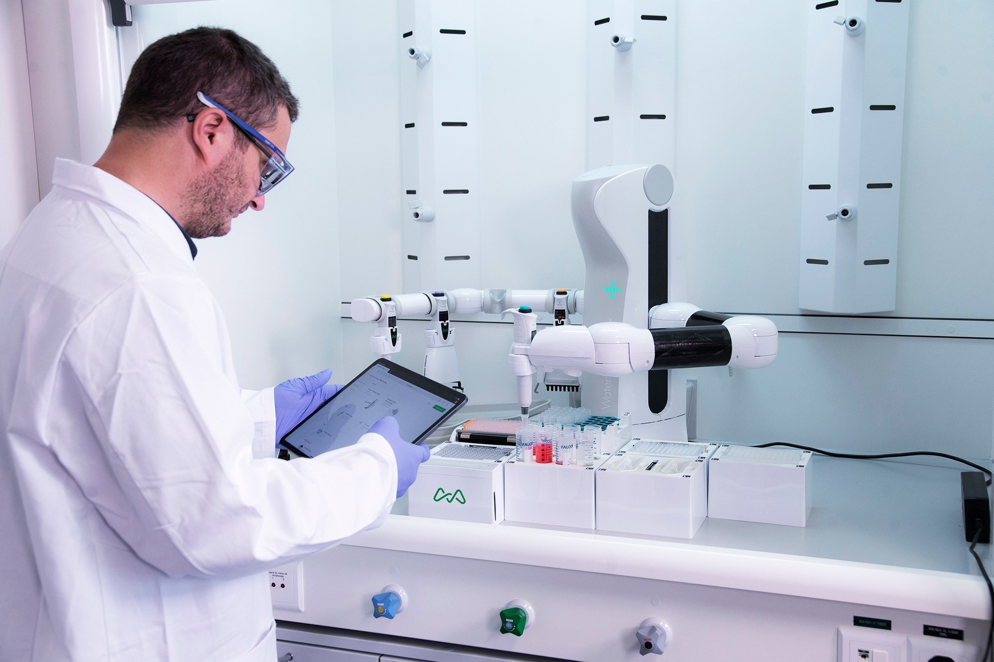 Scientist with Andrew+ and tablet running OneLab app