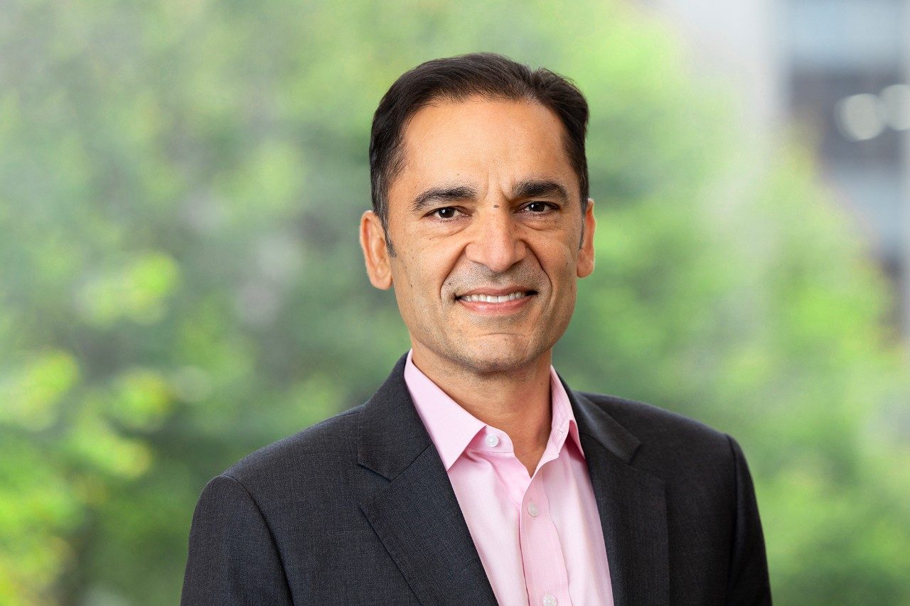Udit Batra smiling at camera