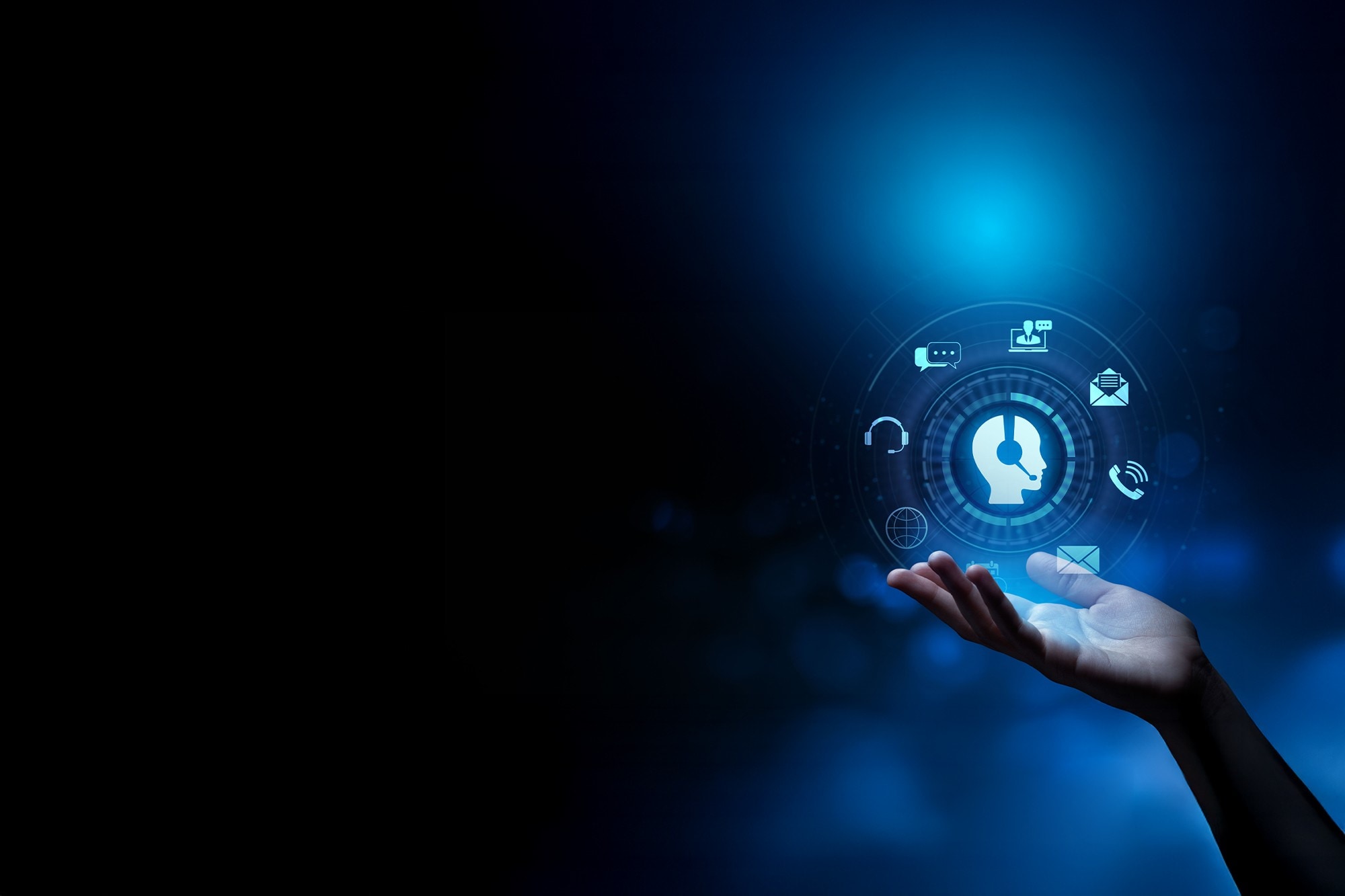 Hand holding hologram graphic with customer service icons