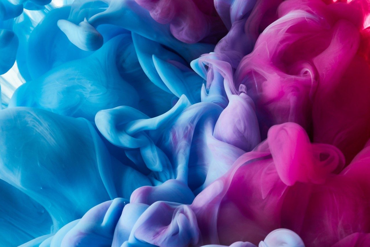 Ink drops in water background