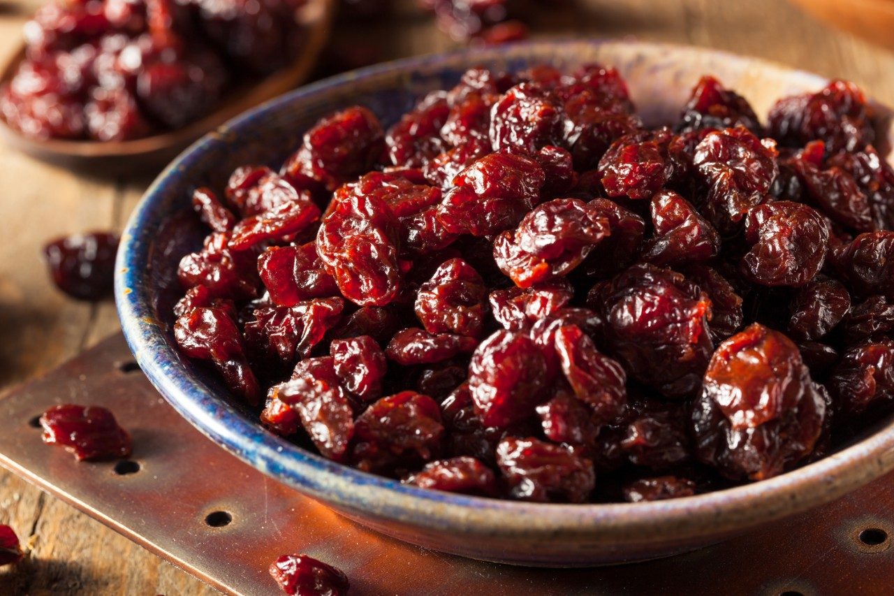 Organic raw dried cherries in a bowl