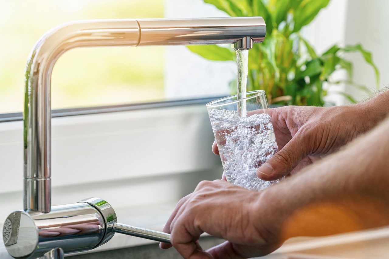 Filling glass of water from kitchen faucet