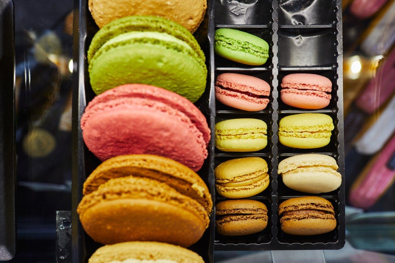 Multi-colored macaroons in tray