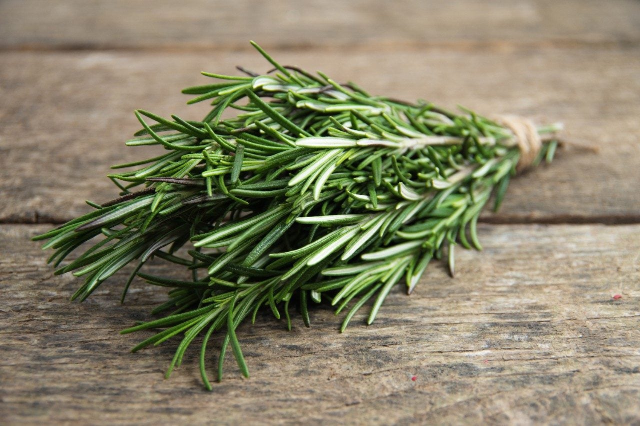 Rosemary bound on a wooden board