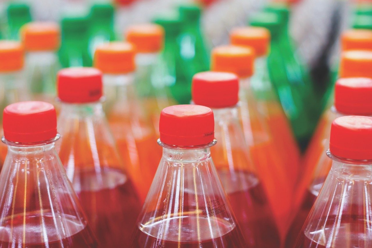 Plastic bottles with soft drinks