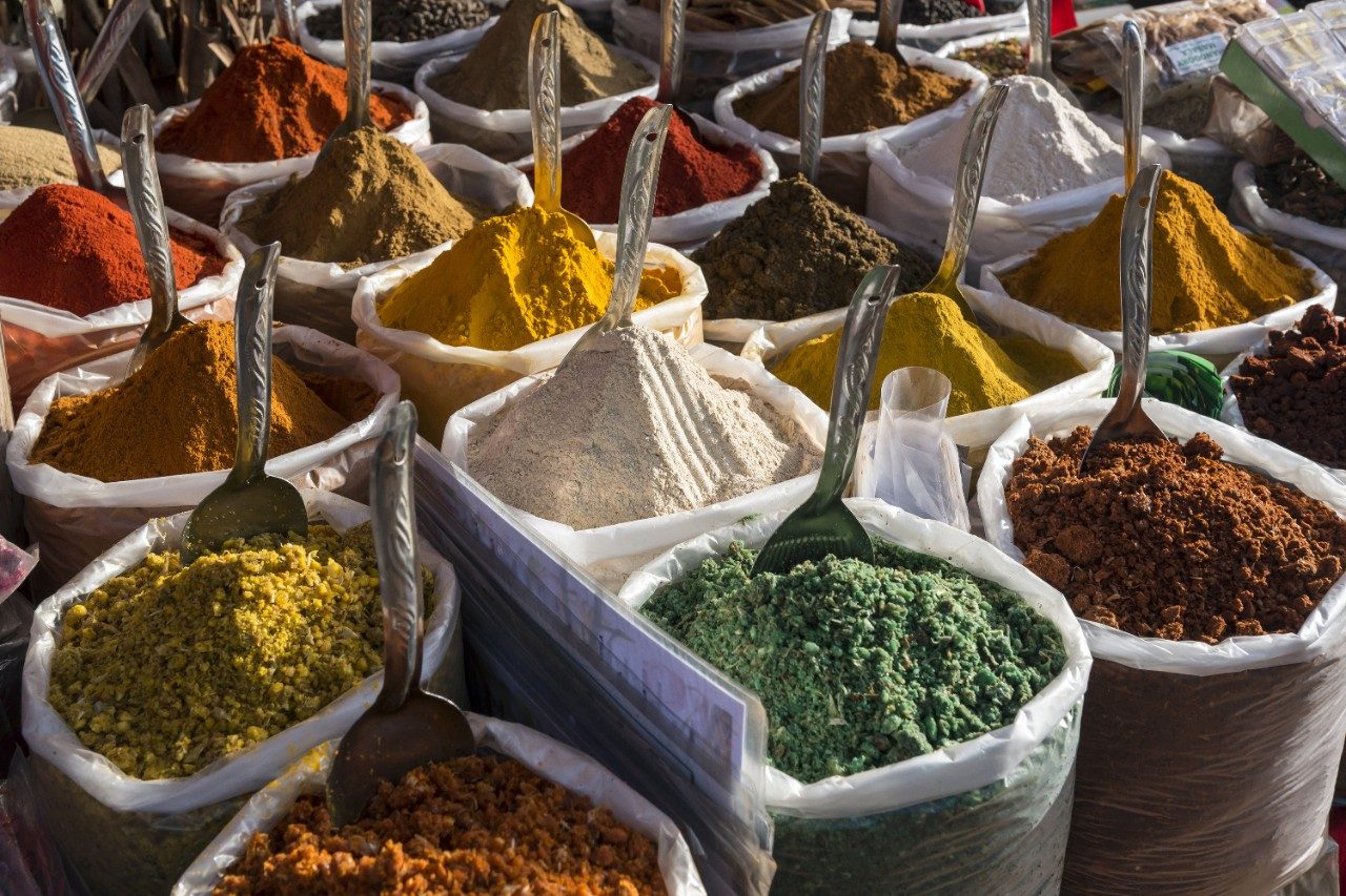 Sacks of spices, herbs, and curry powders