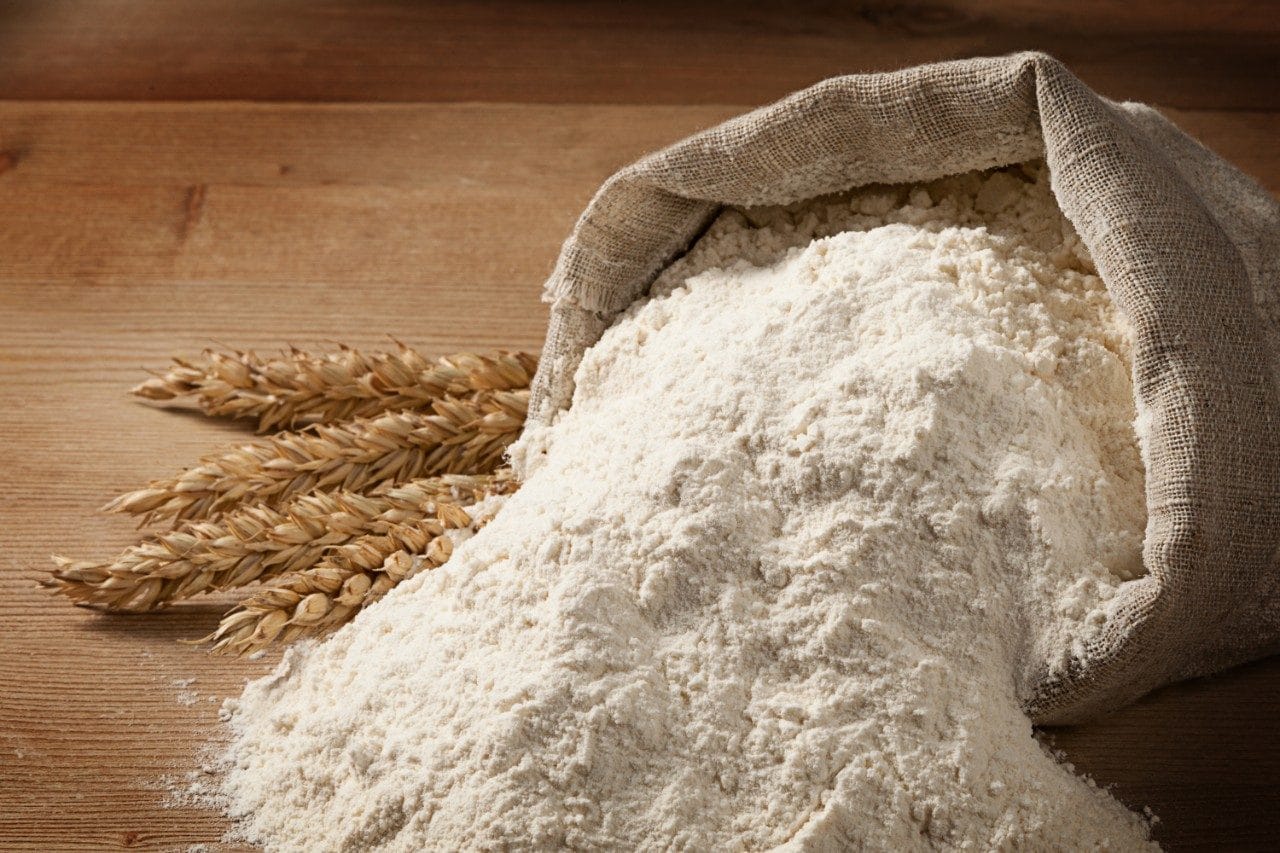 Wheat flour spilling from sack