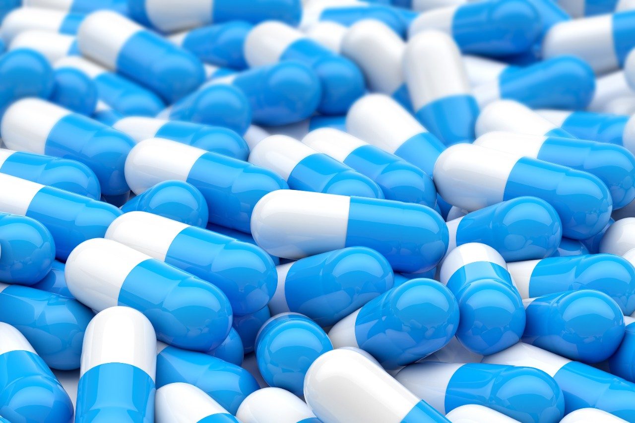 White and blue capsule pills