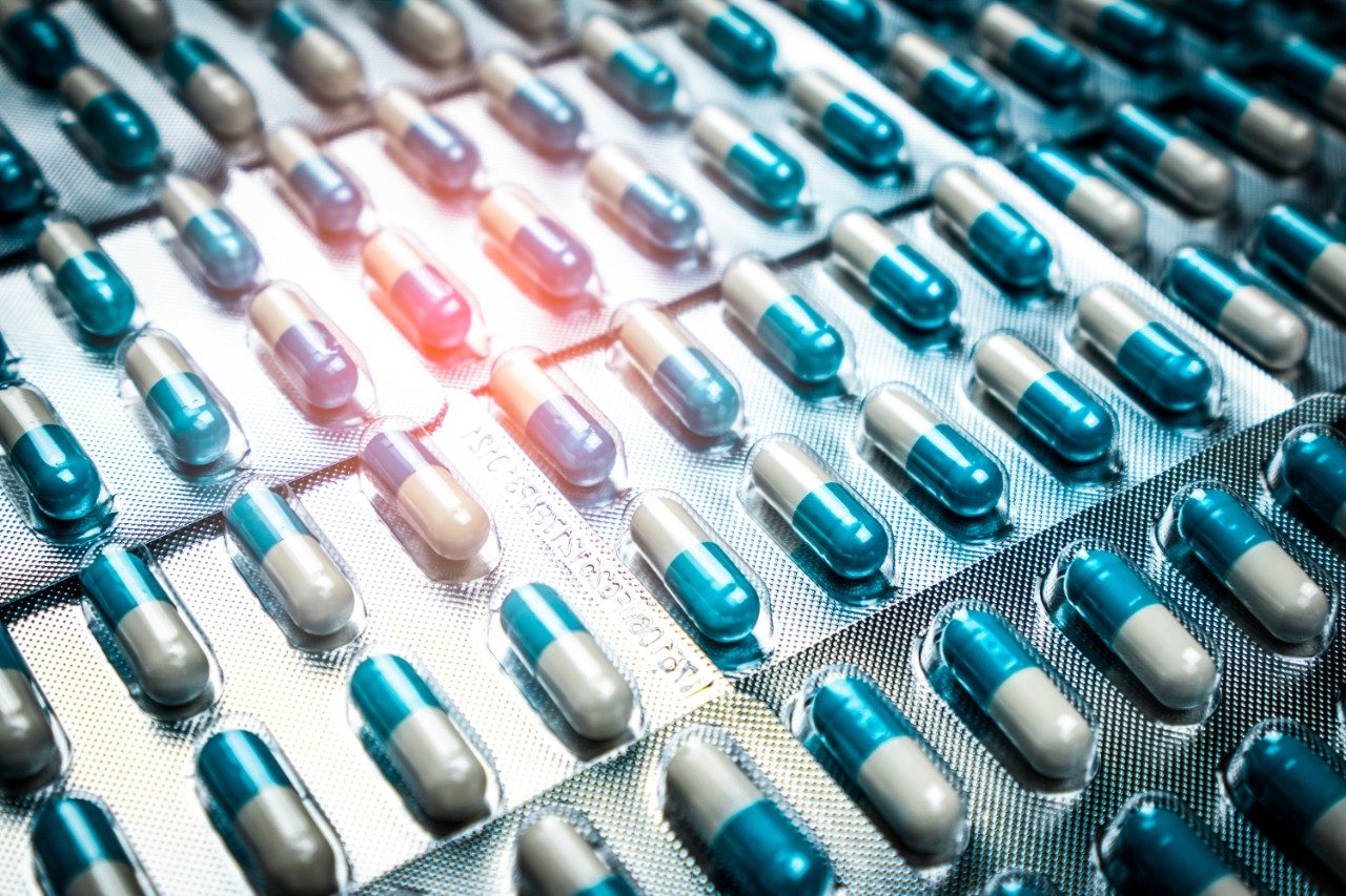 Blue and white capsules pill in blister pack