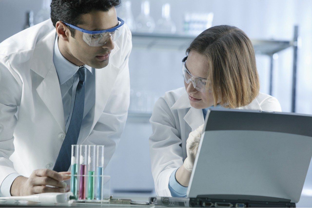 Scientists in laboratory doing research