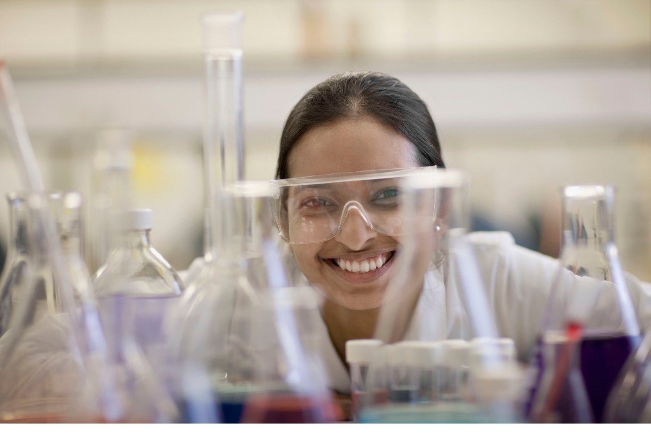 Female Indian scientist working in laboratory