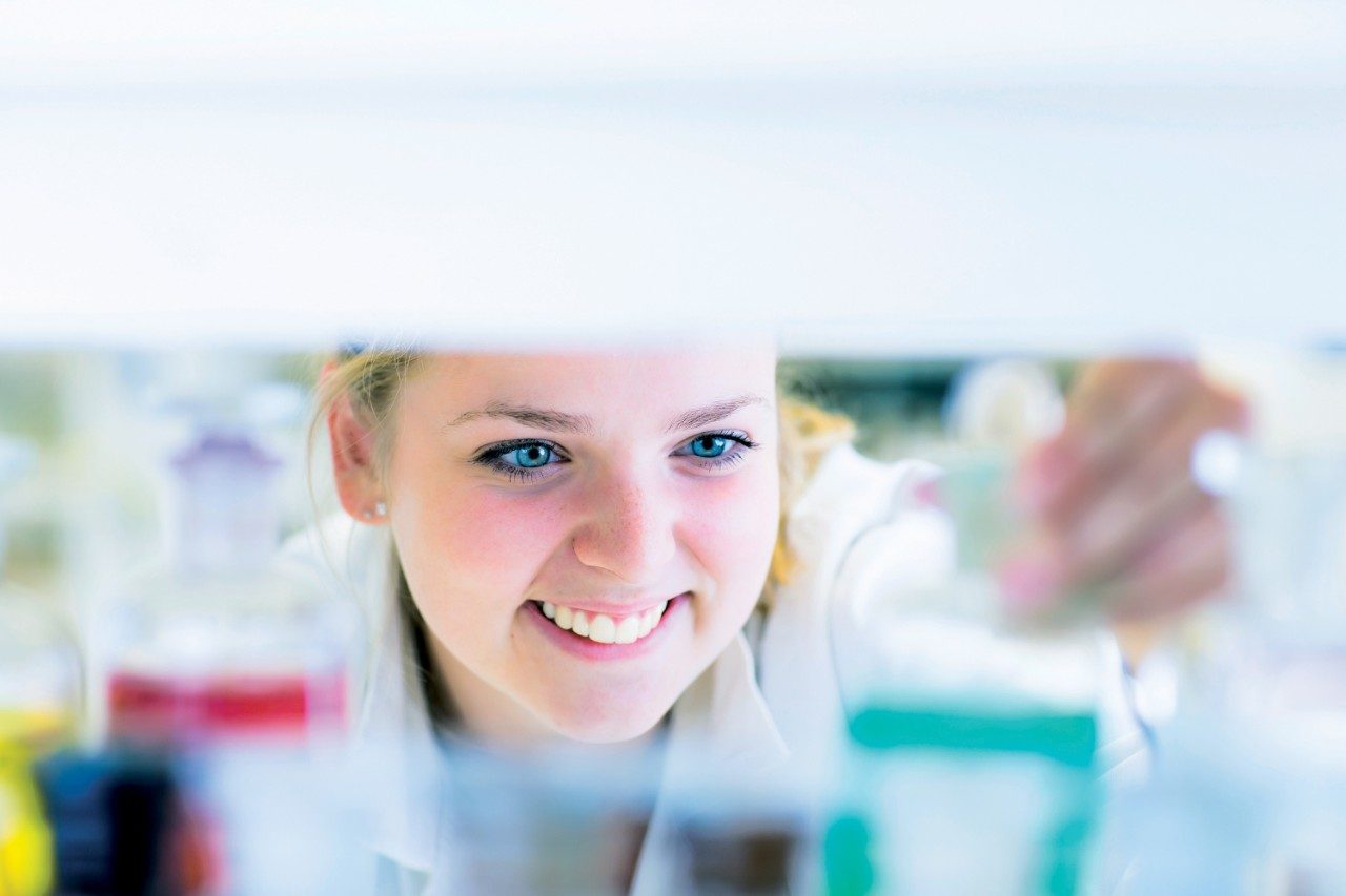 Female researcher carrying out research in a chemistry lab